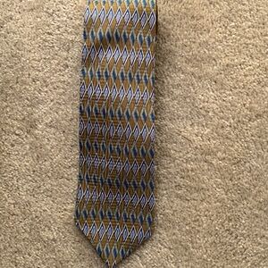 UMBERTO BOSSI. 100% Silk necktie. Handmade.Diamond shapes. Gold/Blue/Whi…